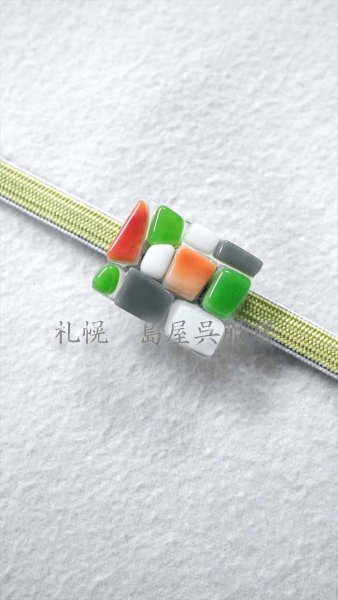 厚みのあるリバーシブルの三分紐でも通ります